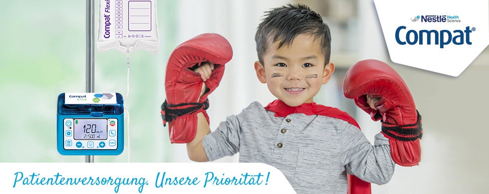 Compat Flex et enfant avec gants de boxe rouges